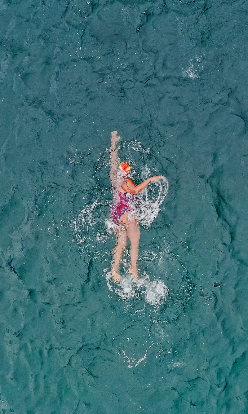 A person wakeboarding on a lake